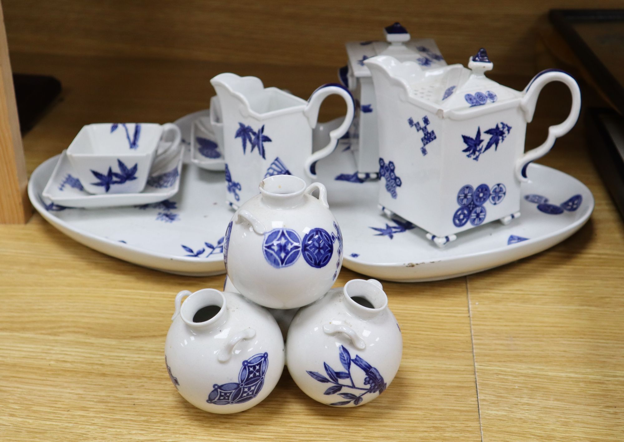 A Royal Worcester Aesthetic period cabaret set and a similar multi-globe vase